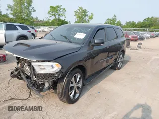 2014 Dodge Durango R/T with VIN 1C4SDHCT4EC513789, listed as a IAAI auction lot 42389059 with 151,506 mi miles and . Bid and sale history available at DreamBid. Image 2.