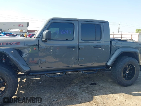 2022 Jeep Gladiator Mojave with VIN 1C6JJTEGXNL155838, listed as a IAAI auction lot 41968917 with 54,495 mi miles and . Bid and sale history available at DreamBid. Image 15.