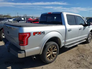 2015 Ford F-150 XLT with VIN 1FTEW1EG4FKE71212, listed as a IAAI auction lot 41738758 with 208,429 mi miles. Bid and sale history available at carsss.com. Image 4.