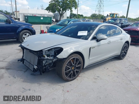 2018 Porsche Panamera 4 E-Hybrid z VIN WP0AE2A7XJL174378, wystawiony jako IAAI lot #42303125 z przebiegiem 35 636 mil mil oraz . Historia ofert i sprzedaży dostępna na DreamBid. Obrazek 19.