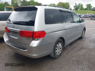 2010 Honda Odyssey EX with VIN 5FNRL3H48AB017784, listed as a IAAI auction lot 42096852 with 126,138 mi miles. Bid and sale history available at carsss.com. Image 4.