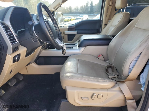 2015 Ford F-150 XLT with VIN 1FTEW1EG1FFC61935, listed as a Copart auction lot 47077015 with 127,798 mi miles and Salvage Title. Bid and sale history available at carsss.com. Image 7.
