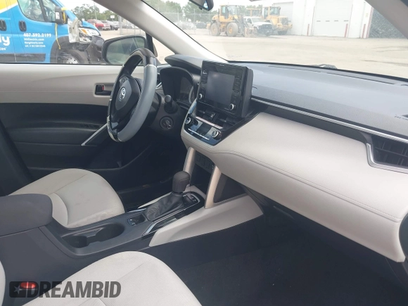 2022 Toyota Corolla Cross L with VIN 7MUAAAAGXNV019426, listed as a IAAI auction lot 42169842 with 46,185 mi miles and . Bid and sale history available at DreamBid. Image 5.