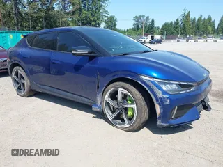 2023 Kia EV6 GT z VIN KNDC5DLE5P5102016, wystawiony jako IAAI lot #42421490 z przebiegiem 48 249 mil mil oraz . Historia ofert i sprzedaży dostępna na DreamBid. Obrazek 1.