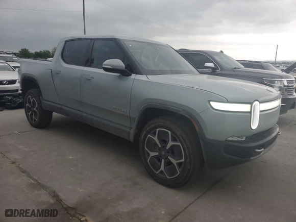 2022 Rivian R1T Adventure Package with VIN 7FCTGAAA0NN014488, listed as a Copart auction lot 51024514 with 18,721 mi miles and Salvage Title. Bid and sale history available at carsss.com. Image 4.