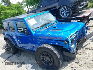 2021 Jeep Wrangler Unlimited Rubicon with VIN 1C4JJXFG3MW833275, listed as a IAAI auction lot 39371948 with 43,428 mi miles. Bid and sale history available at carsss.com. Image 13.
