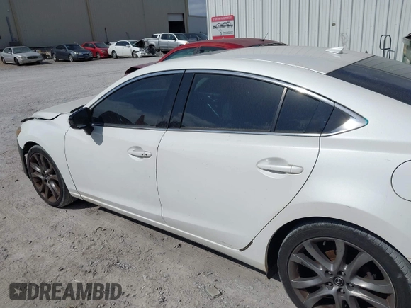 2015 Mazda 6 i Grand Touring with VIN JM1GJ1W50F1204322, listed as a IAAI auction lot 40694216 with 141,357 mi miles. Bid and sale history available at carsss.com. Image 14.