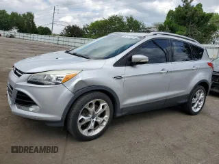 2013 Ford Escape Titanium с VIN 1FMCU9J92DUD31093, выставлен на аукционе Copart как лот 57121425 с пробегом 107 979 миль миль и Списание • Salvage title. История ставок и продаж доступна на DreamBid. Изображение 1.