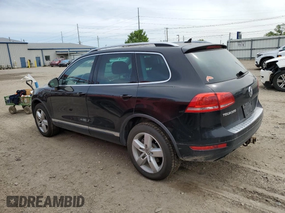 2012 Volkswagen Touareg Sport with VIN WVGFF9BP8CD001039, listed as a Copart auction lot 57764125 with 128,540 mi miles and Clean title. Bid and sale history available at DreamBid. Image 2.