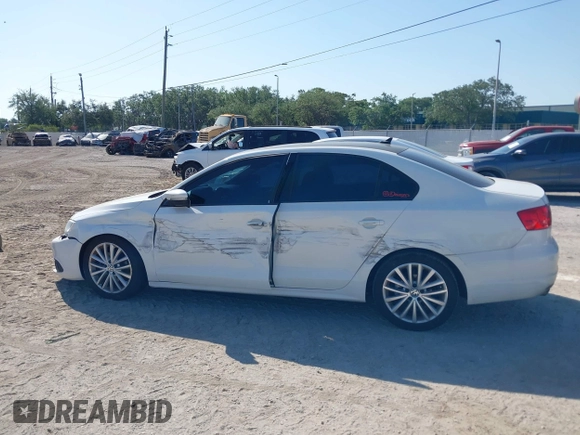 2013 Volkswagen Jetta TDI w/Premium with VIN 3VWLL7AJXDM392313, listed as a IAAI auction lot 42131758 with 98,618 mi miles and . Bid and sale history available at DreamBid. Image 14.