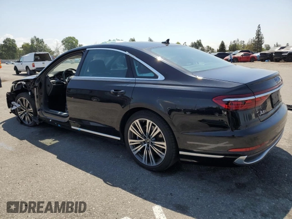 2022 Audi A8 with VIN WAULDAF86NN001617, listed as a Copart auction lot 63068504 with 25,974 mi miles and Salvage title. Bid and sale history available at DreamBid. Image 2.