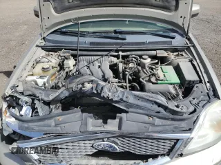 2006 Ford Five Hundred SE с VIN 1FAFP23146G150401, выставлен на аукционе Copart как лот 57000605 с пробегом 218 689 миль миль и Списание • Salvage title. История ставок и продаж доступна на DreamBid. Изображение 11.