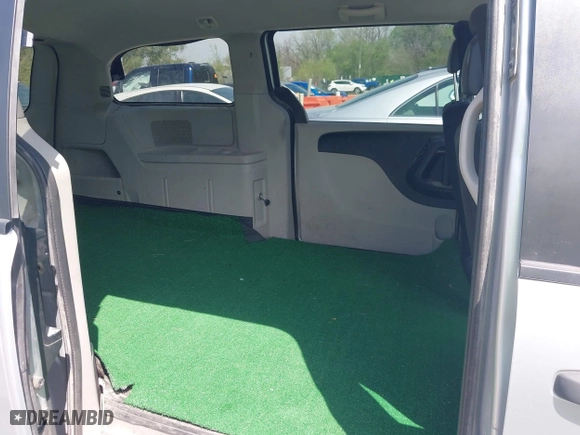 2012 Ram Cargo Van with VIN 2C4RDGAGXCR243180, listed as a IAAI auction lot 42061918 with 204,251 mi miles. Bid and sale history available at carsss.com. Image 8.