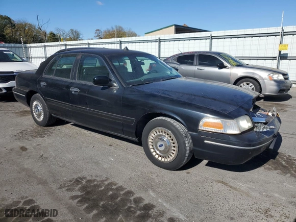 2001 Ford Crown Victoria Police Pkg Police Interceptor with VIN 2FAFP71W41X205475, listed as a Copart auction lot 75265194 with 117,633 mi miles and Salvage Title. Bid and sale history available at carsss.com. Image 4.