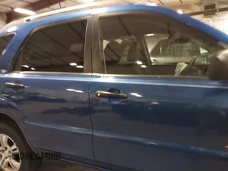 2006 Kia Sportage LX z VIN KNDJE723467245423, wystawiony jako IAAI lot #41388807 z przebiegiem 135 484 mil mil oraz . Historia ofert i sprzedaży dostępna na DreamBid. Obrazek 14.