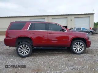 2016 Chevrolet Tahoe LT z VIN 1GNSKBKC9GR454203, wystawiony jako IAAI lot #42198952 z przebiegiem 145 422 mil mil oraz . Historia ofert i sprzedaży dostępna na DreamBid. Obrazek 13.