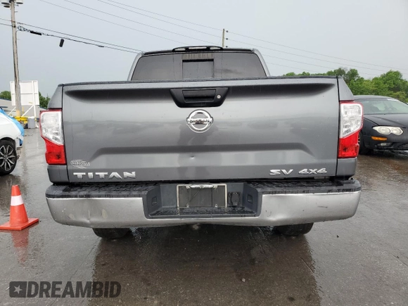 2017 Nissan Titan SV z VIN 1N6AA1EJ1HN572201, wystawiony jako Copart lot #54066705 z przebiegiem Nie podano mil oraz Czysty tytuł • Clean title. Historia ofert i sprzedaży dostępna na DreamBid. Obrazek 6.