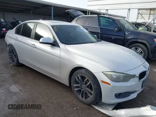 2015 BMW 3 Series 320i with VIN WBA3B1C55FK140818, listed as a IAAI auction lot 41706417 with 159,307 mi miles and . Bid and sale history available at DreamBid. Image 1.
