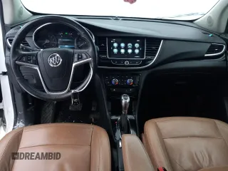 2019 Buick Encore Essence with VIN KL4CJGSM5KB738932, listed as a Copart auction lot 83087444 with 59,162 mi miles and Salvage Title. Bid and sale history available at DreamBid. Image 8.