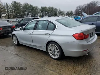 2014 BMW 3 Series 328i with VIN WBA3C1C57EK111414, listed as a Copart auction lot 49279425 with 68,999 mi miles and Salvage Title. Bid and sale history available at carsss.com. Image 2.