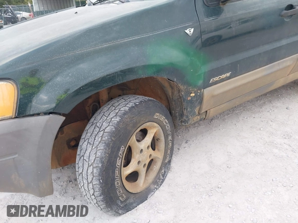2002 Ford Escape with VIN 1FMCU02132KD51298, listed as a IAAI auction lot 41550132 with 218,830 mi miles and . Bid and sale history available at DreamBid. Image 6.