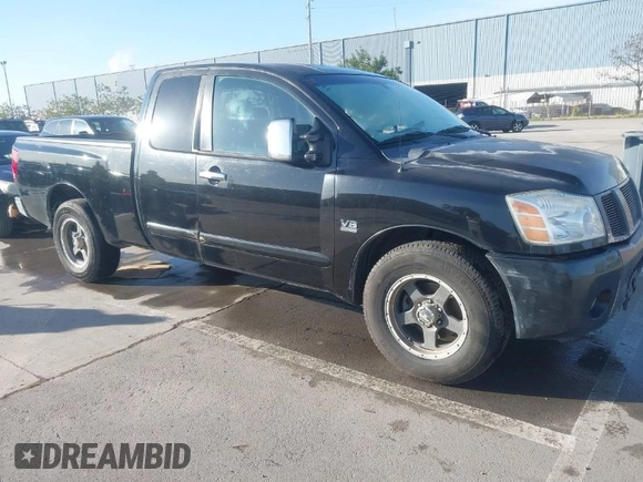 2004 Nissan Titan SE with VIN 1N6AA06A14N574940, listed as a IAAI auction lot 41821005 with 202,373 mi miles. Bid and sale history available at carsss.com. Image 1.