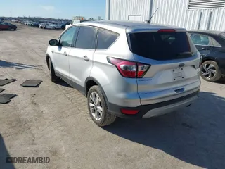 2017 Ford Escape SE with VIN 1FMCU0GD3HUD16065, listed as a IAAI auction lot 41667562 with 108,286 mi miles. Bid and sale history available at carsss.com. Image 3.