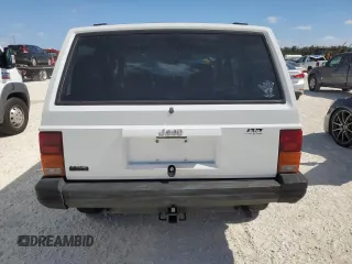 1994 Jeep Cherokee SE with VIN 1J4FT28SXRL151422, listed as a Copart auction lot 77358594 with 74,628 mi miles and Salvage Title. Bid and sale history available at carsss.com. Image 6.
