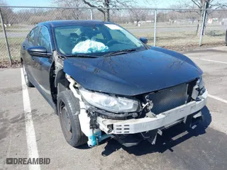 2017 Honda Civic Sedan LX with VIN 2HGFC2F57HH533231, listed as a IAAI auction lot 41897620 with 141,210 mi miles. Bid and sale history available at carsss.com. Image 6.