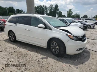 2014 Honda Odyssey Touring with VIN 5FNRL5H92EB020189, listed as a Copart auction lot 62311425 with Not provided miles and Clean title. Bid and sale history available at DreamBid. Image 4.