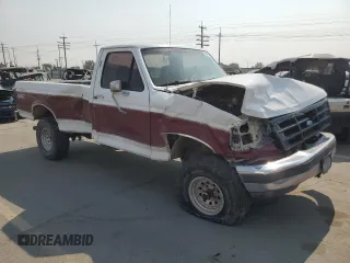 1992 Ford F-150 with VIN 1FTEF14HXNPA24587, listed as a Copart auction lot 70803324 with 0 mi miles and Salvage Title. Bid and sale history available at carsss.com. Image 4.