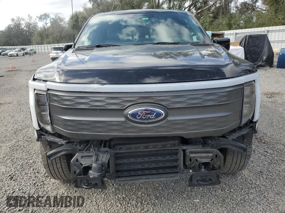 2022 Ford F-150 Lightning Pro z VIN 1FT6W1EV4NWG14041, wystawiony jako Copart lot #85252844 z przebiegiem 31 093 mil mil oraz Szkoda całkowita • Salvage title. Historia ofert i sprzedaży dostępna na DreamBid. Obrazek 5.