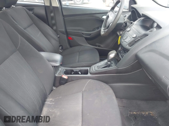 2018 Ford Focus SE z VIN 1FADP3FE5JL228583, wystawiony jako IAAI lot #42313614 z przebiegiem 84 240 mil mil oraz . Historia ofert i sprzedaży dostępna na DreamBid. Obrazek 5.