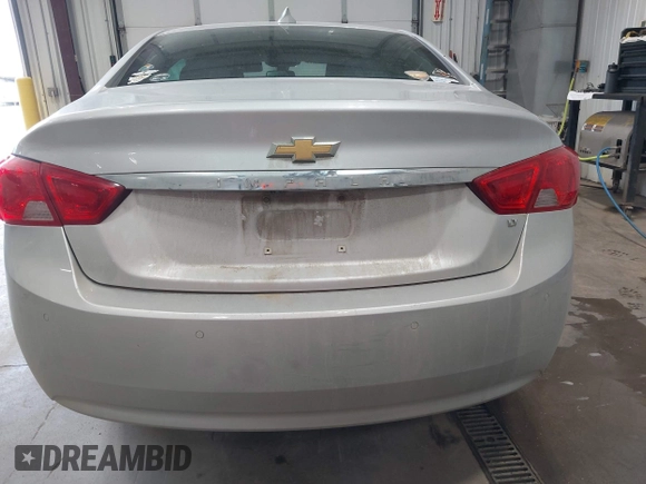 2016 Chevrolet Impala LT with VIN 2G1105SA1G9162946, listed as a IAAI auction lot 42704246 with 156,205 mi miles and . Bid and sale history available at DreamBid. Image 16.