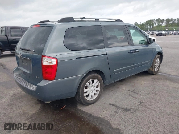 2006 Kia Sedona LX with VIN KNDMB233766015453, listed as a IAAI auction lot 41940305 with 189,319 mi miles. Bid and sale history available at carsss.com. Image 4.
