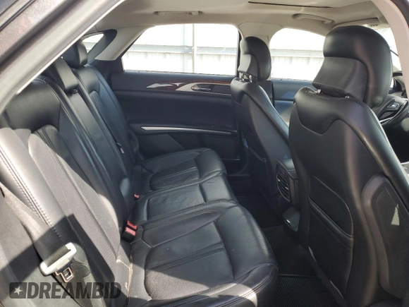 2015 Lincoln MKZ z VIN 3LN6L2JKXFR600669, wystawiony jako Copart lot #51130115 z przebiegiem 75 176 mil mil oraz Szkoda całkowita • Salvage title. Historia ofert i sprzedaży dostępna na DreamBid. Obrazek 10.