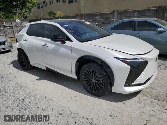 2023 Lexus RZ 450e Premium z VIN JTJAAAAB9PA011698, wystawiony jako Copart lot #64390964 z przebiegiem 12 303 mil mil oraz Szkoda całkowita • Salvage title. Historia ofert i sprzedaży dostępna na DreamBid. Obrazek 4.