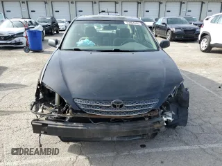 2002 Toyota Camry XLE z VIN 4T1BF32K02U034535, wystawiony jako Copart lot #53894995 z przebiegiem 253 037 mil mil oraz Szkoda całkowita • Salvage title. Historia ofert i sprzedaży dostępna na DreamBid. Obrazek 5.