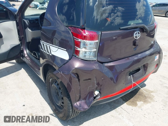 2012 Scion iQ with VIN JTNJJXB0XCJ021245, listed as a IAAI auction lot 42463167 with 158,901 mi miles and . Bid and sale history available at DreamBid. Image 6.