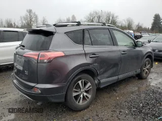 2018 Toyota RAV4 XLE with VIN JTMRFREV0JJ200337, listed as a Copart auction lot 84901594 with 57,301 mi miles and Salvage Title. Bid and sale history available at DreamBid. Image 3.