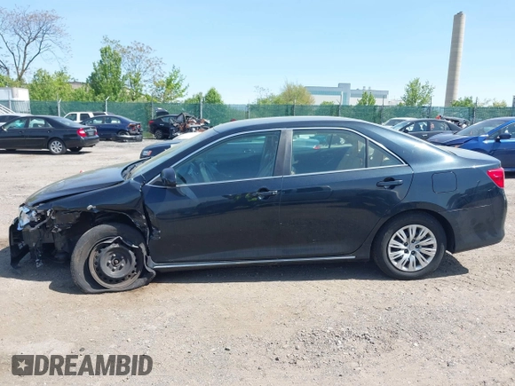 2012 Toyota Camry L with VIN 4T1BF1FK0CU599819, listed as a IAAI auction lot 42158719 with 130,038 mi miles. Bid and sale history available at carsss.com. Image 13.