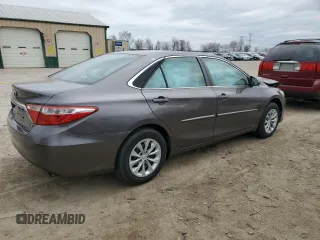 2015 Toyota Camry XLE with VIN 4T1BF1FK7FU906004, listed as a Copart auction lot 50957935 with 105,440 mi miles and Salvage Title. Bid and sale history available at carsss.com. Image 3.