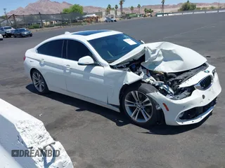 2018 BMW 4 Series 430i with VIN WBA4J1C50JBG75834, listed as a IAAI auction lot 42479042 with 67,478 mi miles and . Bid and sale history available at DreamBid. Image 1.