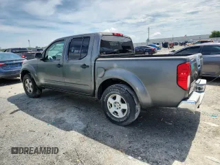 2005 Nissan Frontier LE with VIN 1N6AD07UX5C450937, listed as a Copart auction lot 64102725 with 210,701 mi miles and Clean title. Bid and sale history available at DreamBid. Image 2.