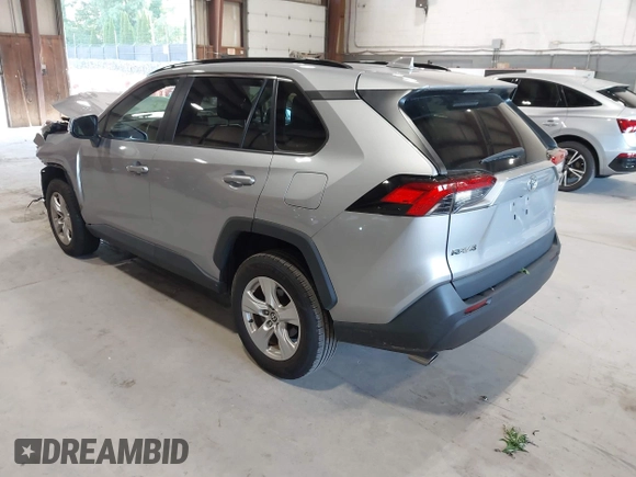 2021 Toyota RAV4 XLE with VIN 2T3P1RFV5MC180890, listed as a IAAI auction lot 42567858 with 56,961 mi miles and . Bid and sale history available at DreamBid. Image 3.