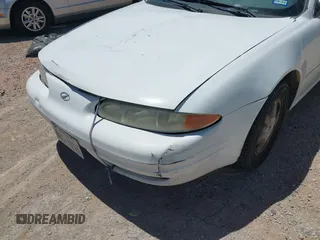 2002 Oldsmobile Alero GL1 with VIN 1G3NL52E22C190713, listed as a IAAI auction lot 42108413 with 188,534 mi miles and . Bid and sale history available at DreamBid. Image 6.