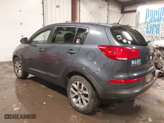 2014 Kia Sportage LX with VIN KNDPBCAC5E7619193, listed as a IAAI auction lot 41599236 with 124736 miles. Bid and sale history available at carsss.com. Image 3.