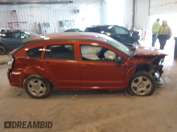 2009 Dodge Caliber SXT with VIN 1B3HB48A59D168273, listed as a IAAI auction lot 41988835 with 200,125 mi miles and . Bid and sale history available at DreamBid. Image 13.