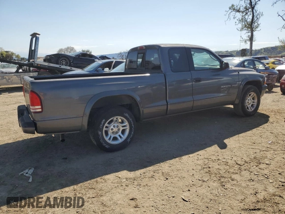 2002 Dodge Dakota z VIN 1B7GL32N62S551525, wystawiony jako Copart lot #48777025 z przebiegiem 91 438 mil mil oraz Czysty tytuł • Clean title. Historia ofert i sprzedaży dostępna na DreamBid. Obrazek 3.