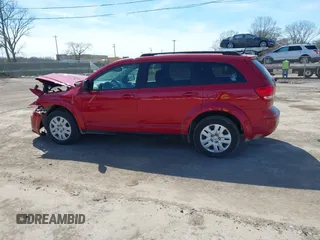 2016 Dodge Journey SE with VIN 3C4PDCAB2GT165839, listed as a IAAI auction lot 42045161 with 147,007 mi miles and . Bid and sale history available at DreamBid. Image 14.